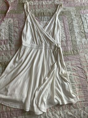 💙Kimchi Blue Cream Wrap Mini Dress with Tie Shorts attached underneath skirt.